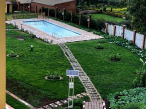 Отель Kigali Village Suites  Кигали